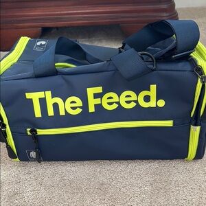 The Feed Navy and Neon Green “race cube”